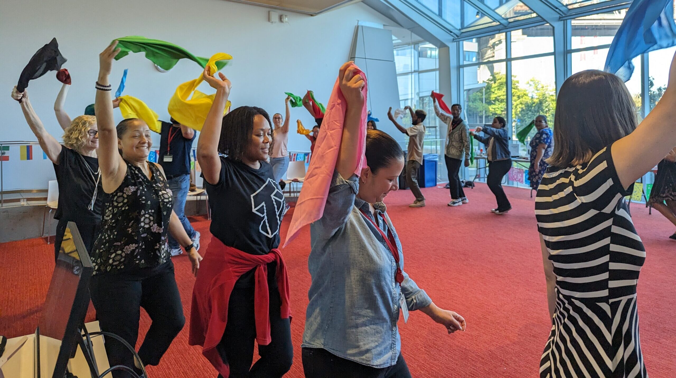 Cornell Tech staff members participating in a Latin Dance Workshop, hosted by the DEIB Staff Committee in collaboration with Ballet Hispánico.